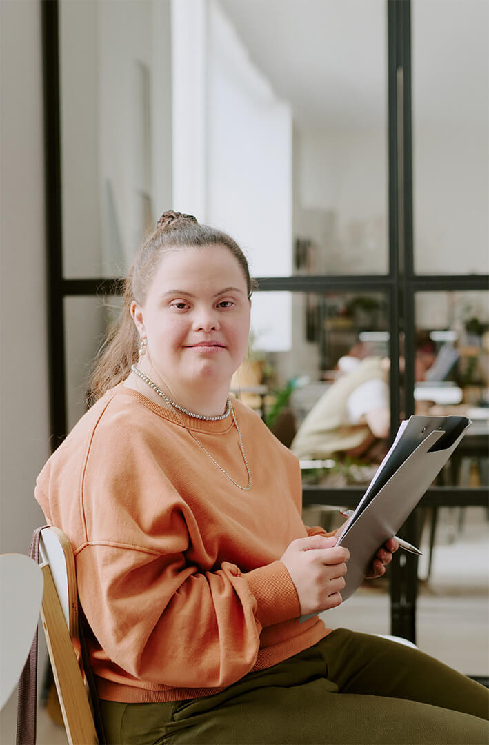 Woman employee with a clipboard