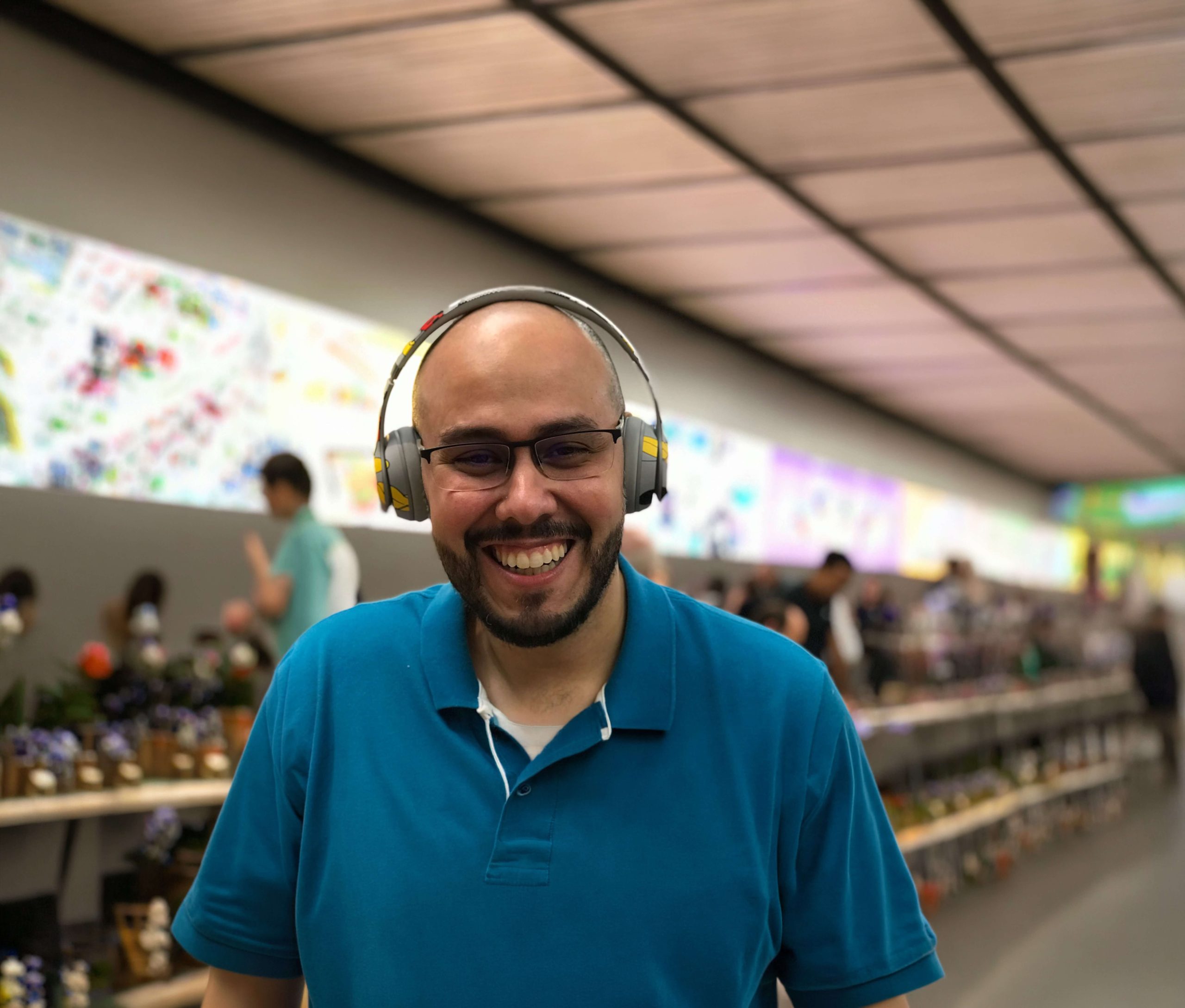 portrait-smiling-man-listening-music-tinified(1)-tinified