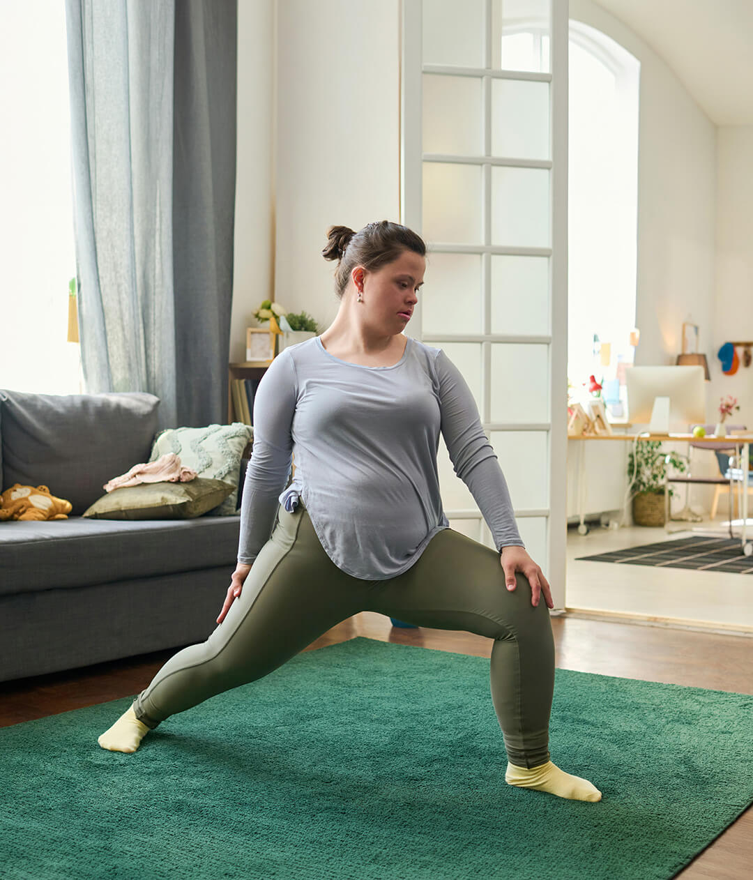 Woman with Down's syndrome does yoga