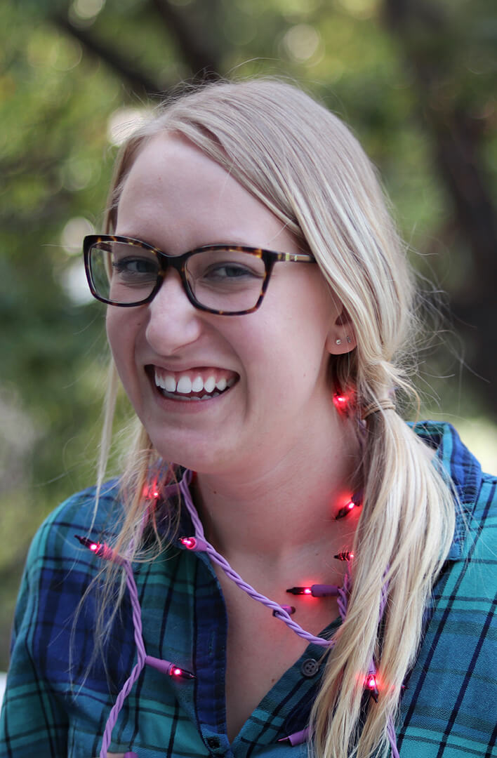 portrait-smiling-young-woman(1-scaled)-tinified